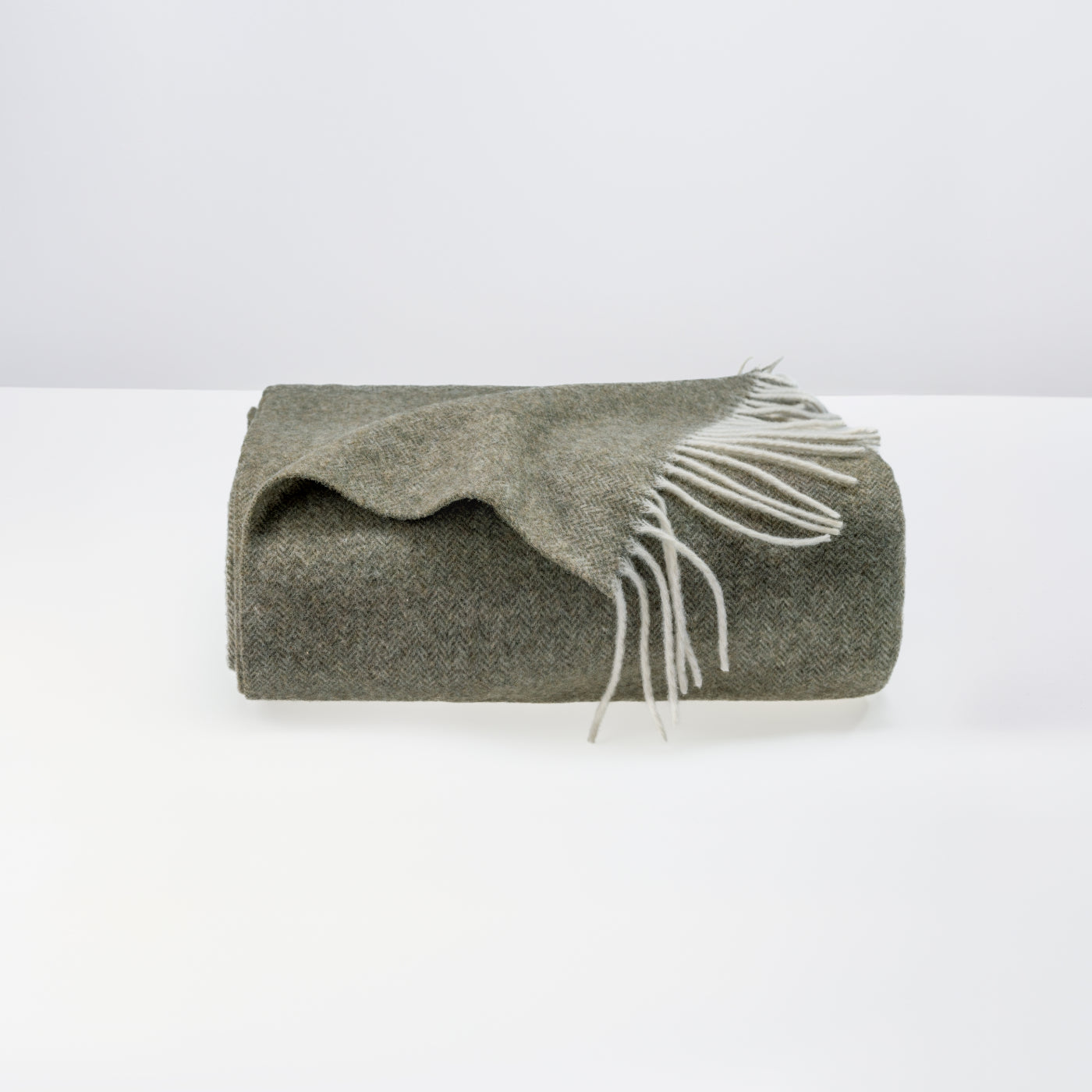 Pure merino and cashmere wool sofa throw in Dark Sage 200x140cm