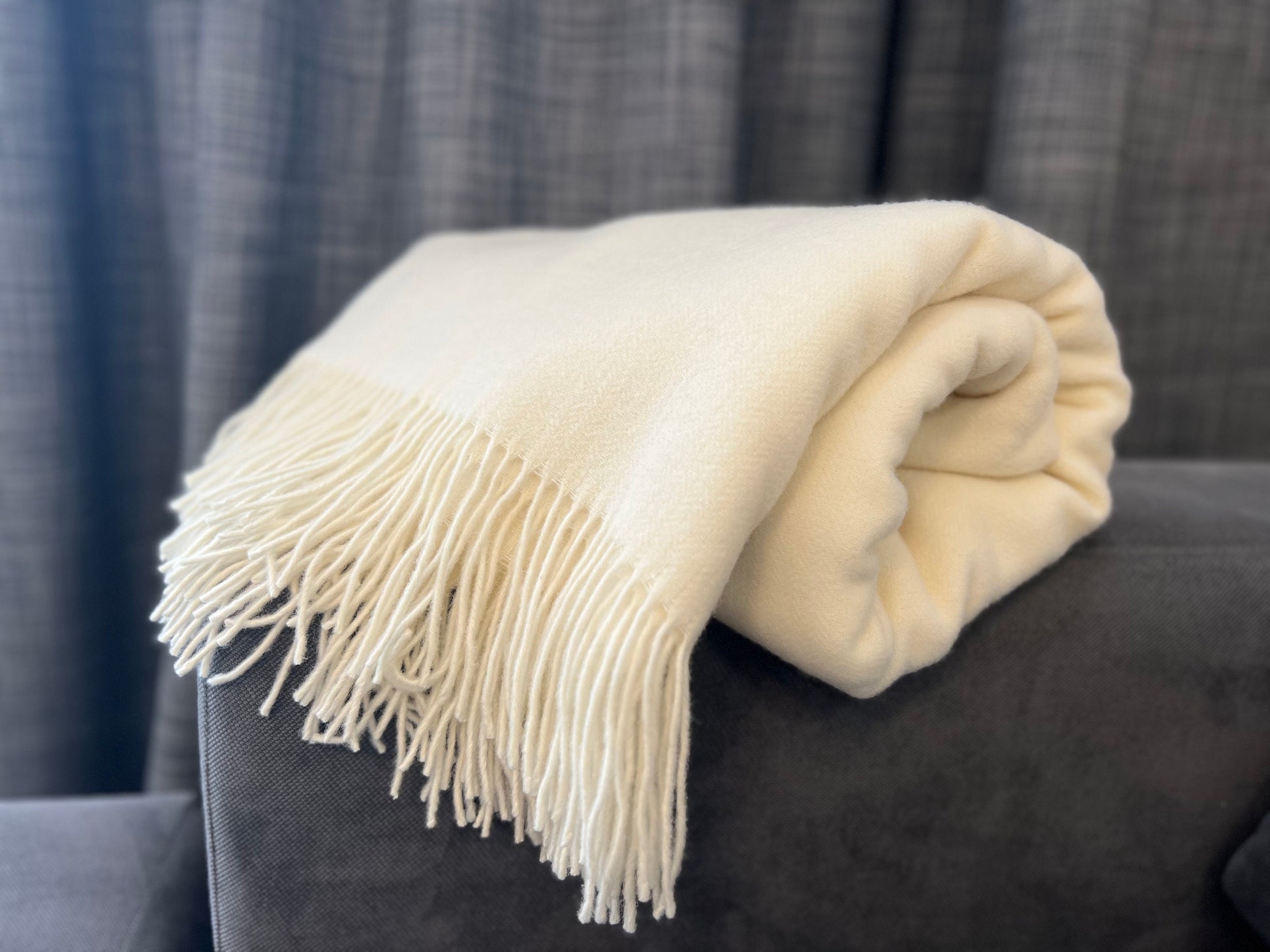 Luxury Wool Sofa Throw in Champagne colour made of premium quality Cashmere and Merino yarn 