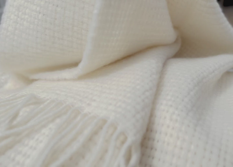 Soft wool blanket with fringe folding movment